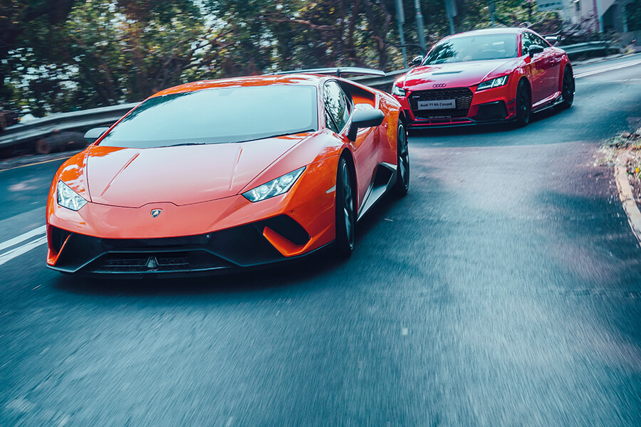 Audi TT RS chasing Lamborghini Huracan performante